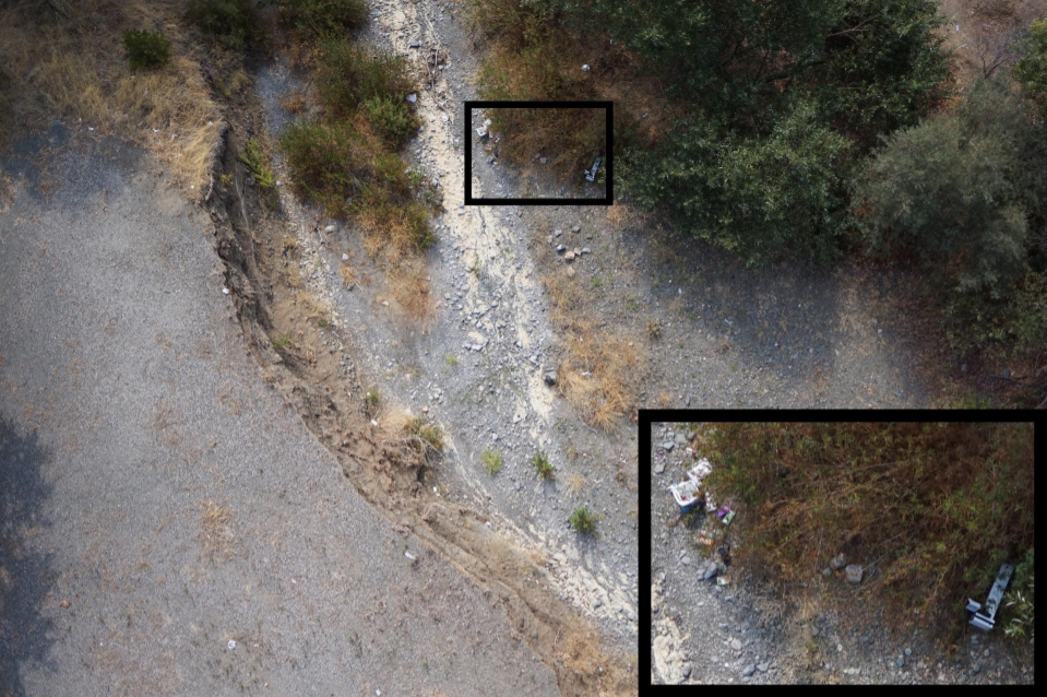 Image from a 2018 flight above a dry Kirker Creek in Pittsburg, CA, showing trash from above. Image credit SFEI